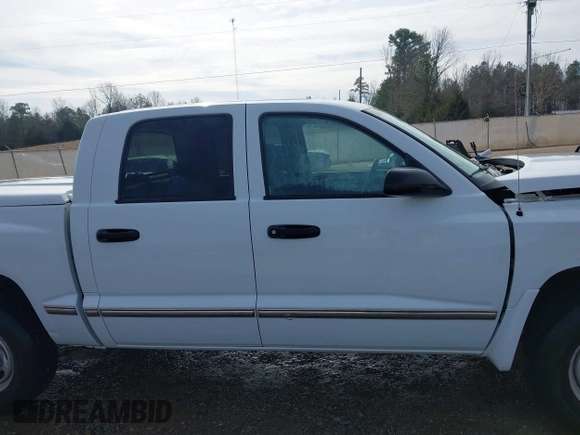 2006 Dodge Dakota ST with VIN 1D7HE28KX6S521235, listed as a IAAI auction lot 41417944 with 122,761 mi miles and . Bid and sale history available at carsss.com. Image 14.