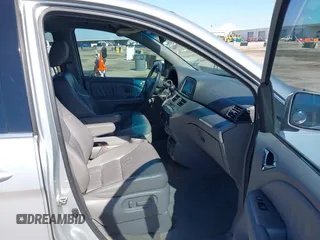 2010 Honda Odyssey Touring with VIN 5FNRL3H97AB015472, listed as a IAAI auction lot 41763680 with 144,309 mi miles. Bid and sale history available at carsss.com. Image 5.