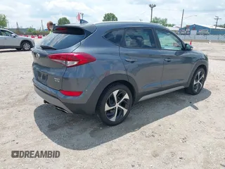 2018 Hyundai Tucson Sport z VIN KM8J3CAL9JU752050, wystawiony jako IAAI lot #42558721 z przebiegiem 173 974 mil mil oraz . Historia ofert i sprzedaży dostępna na DreamBid. Obrazek 4.