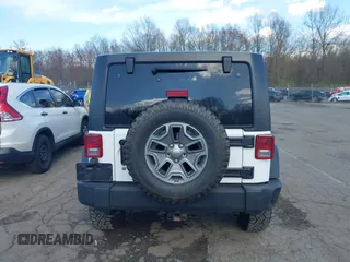 2015 Jeep Wrangler Unlimited Rubicon with VIN 1C4BJWFGXFL507315, listed as a IAAI auction lot 42059720 with 90,189 mi miles and . Bid and sale history available at DreamBid. Image 16.
