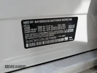 2020 BMW X7 xDrive40i with VIN 5UXCW2C06L9B79990, listed as a Copart auction lot 74017634 with 0 mi miles and Non Repairable. Bid and sale history available at carsss.com. Image 14.