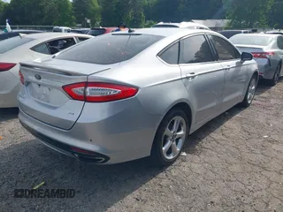 2016 Ford Fusion SE with VIN 3FA6P0T93GR291822, listed as a IAAI auction lot 42216004 with 160,847 mi miles and . Bid and sale history available at DreamBid. Image 4.