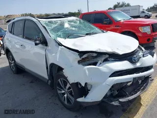 2018 Toyota RAV4 XLE with VIN JTMWFREV0JD132042, listed as a IAAI auction lot 41578567 with NaN miles. Bid and sale history available at carsss.com. Image 1.