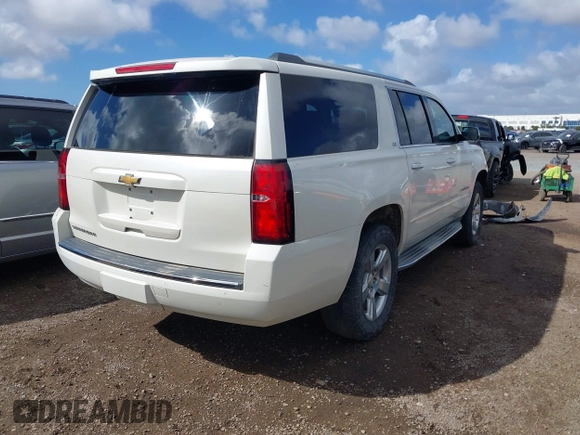 2015 Chevrolet Suburban LTZ with VIN 1GNSKKKC5FR127201, listed as a IAAI auction lot 41706562 with 151,644 mi miles and . Bid and sale history available at DreamBid. Image 4.