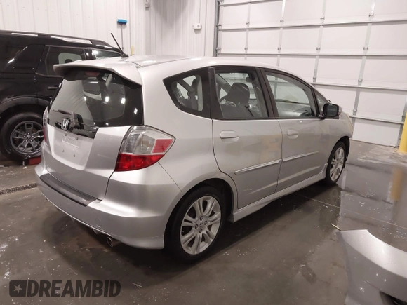 2011 Honda Fit Sport with VIN JHMGE8H58BC007549, listed as a IAAI auction lot 42054956 with 106,248 mi miles and . Bid and sale history available at DreamBid. Image 4.