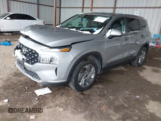 2021 Hyundai Santa Fe SE with VIN 5NMS14AJ4MH330556, listed as a IAAI auction lot 41297743 with 101,156 mi miles. Bid and sale history available at carsss.com. Image 2.