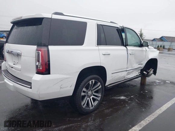2018 GMC Yukon Denali with VIN 1GKS2CKJ8JR274087, listed as a IAAI auction lot 41097872 with 76,828 mi miles. Bid and sale history available at carsss.com. Image 4.
