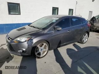 2012 Ford Focus Titanium with VIN 1FAHP3N21CL302058, listed as a Copart auction lot 53574025 with 196,337 mi miles and Clean Title. Bid and sale history available at carsss.com. Image 1.