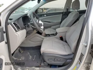2019 Hyundai Tucson Value with VIN KM8J33A48KU962441, listed as a Copart auction lot 64451705 with 60,195 mi miles and Salvage title. Bid and sale history available at DreamBid. Image 7.