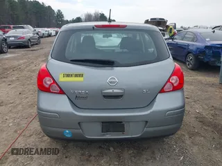 2009 Nissan Versa S with VIN 3N1BC13E59L407294, listed as a IAAI auction lot 41692951 with 250,029 mi miles and . Bid and sale history available at DreamBid. Image 16.
