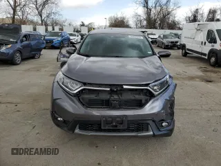 2018 Honda CR-V EX with VIN 7FARW1H51JE052272, listed as a Copart auction lot 49498945 with 61,324 mi miles and Salvage Title. Bid and sale history available at DreamBid. Image 5.