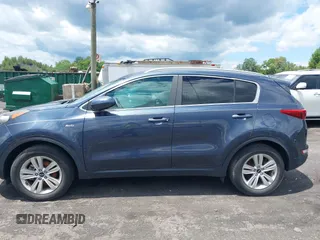 2017 Kia Sportage LX z VIN KNDPMCAC1H7272881, wystawiony jako IAAI lot #38926444 z przebiegiem 12 743 mil mil oraz . Historia ofert i sprzedaży dostępna na DreamBid. Obrazek 13.