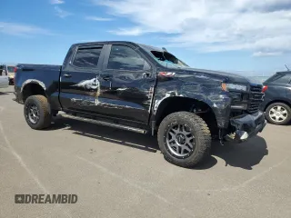 2021 Chevrolet Silverado 1500 LT Trail Boss with VIN 3GCPYFEDXMG455395, listed as a Copart auction lot 59181684 with 31,123 mi miles and Salvage Title. Bid and sale history available at DreamBid. Image 4.