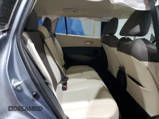 2023 Toyota Corolla Cross XLE with VIN 7MUEAABG4PV062131, listed as a Copart auction lot 56090105 with 43,409 mi miles and Salvage title. Bid and sale history available at DreamBid. Image 11.