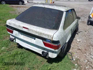 1989 Ford Escort z VIN 1FAPP9591KT185723, wystawiony jako IAAI lot #42257967 z przebiegiem 318 953 mil mil oraz . Historia ofert i sprzedaży dostępna na DreamBid. Obrazek 4.