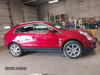 2011 Cadillac SRX Premium Collection with VIN 3GYFNFEY9BS550512, listed as a IAAI auction lot 41866884 with 110,675 mi miles. Bid and sale history available at carsss.com. Image 13.