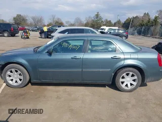 2005 Chrysler 300 with VIN 2C3JA53G35H157178, listed as a IAAI auction lot 41849007 with 149,247 mi miles. Bid and sale history available at carsss.com. Image 13.