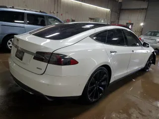 2015 Tesla Model S 85D with VIN 5YJSA1H24FF092628, listed as a Copart auction lot 51959035 with 128,744 mi miles and Salvage Title. Bid and sale history available at carsss.com. Image 3.