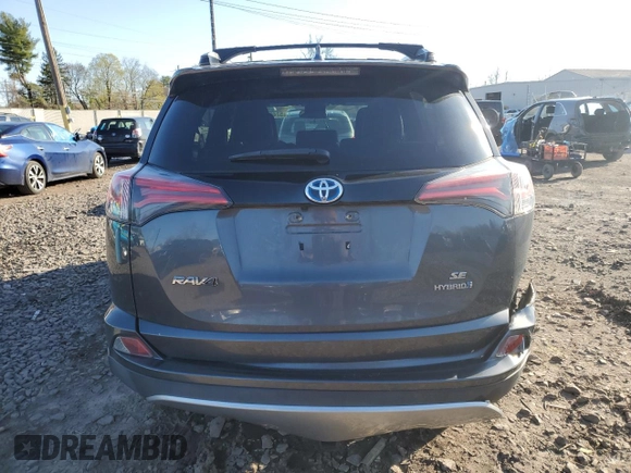2018 Toyota RAV4 Hybrid SE with VIN JTMJJREV5JD210274, listed as a Copart auction lot 52450645 with 108,249 mi miles and Salvage title. Bid and sale history available at DreamBid. Image 6.