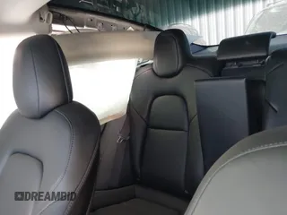 2022 Tesla Model 3 Performance with VIN 5YJ3E1EC3NF194197, listed as a IAAI auction lot 41825401 with Not Provided miles and . Bid and sale history available at DreamBid. Image 8.
