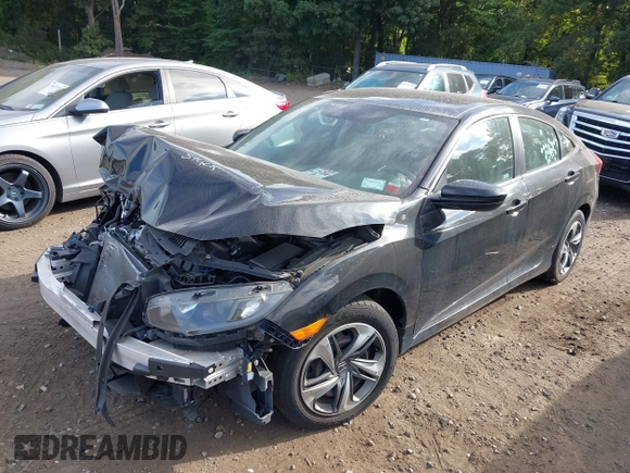 2019 Honda Civic LX with VIN 2HGFC2F65KH549993, listed as a IAAI auction lot 40394538 with 92,951 mi miles and . Bid and sale history available at DreamBid. Image 18.