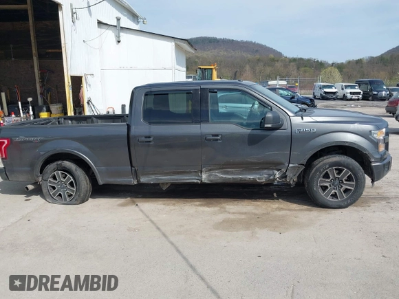 2015 Ford F-150 XLT with VIN 1FTFW1EF9FFA38148, listed as a IAAI auction lot 42069434 with 260,329 mi miles and . Bid and sale history available at DreamBid. Image 13.
