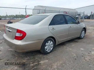 2003 Toyota Camry LE with VIN 4T1BE32K13U787169, listed as a IAAI auction lot 41910931 with 193,198 mi miles and . Bid and sale history available at DreamBid. Image 4.