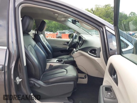 2023 Chrysler Pacifica Touring L with VIN 2C4RC1BG6PR612749, listed as a IAAI auction lot 42612932 with 69,931 mi miles and . Bid and sale history available at DreamBid. Image 5.