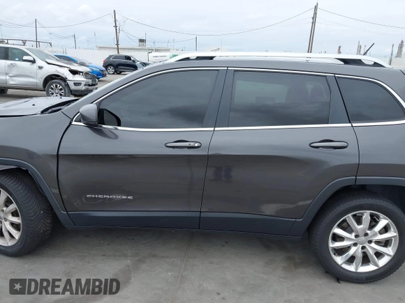 2014 Jeep Cherokee Limited with VIN 1C4PJLDS9EW241875, listed as a IAAI auction lot 42062856 with 90,052 mi miles and . Bid and sale history available at DreamBid. Image 14.
