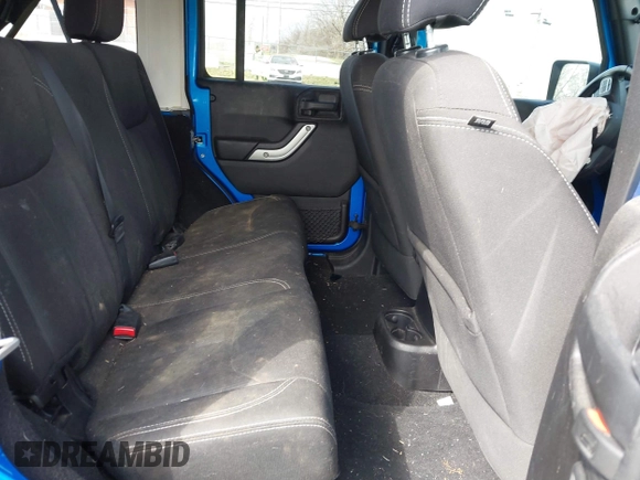 2015 Jeep Wrangler Unlimited Altitude с VIN 1C4HJWEG3FL584314, выставлен на аукционе IAAI как лот 41802581 с пробегом 145 143 миль миль и . История ставок и продаж доступна на DreamBid. Изображение 8.