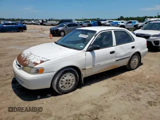 1999 Toyota Corolla VE с VIN 1NXBR12EXXZ237266, выставлен на аукционе Copart как лот 60283855 с пробегом 243 669 миль миль и Списание • Salvage title. История ставок и продаж доступна на DreamBid. Изображение 1.