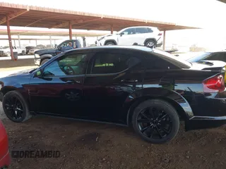 2014 Dodge Avenger SE z VIN 1C3CDZAG6EN138108, wystawiony jako IAAI lot #42068904 z przebiegiem 136 618 mil mil oraz . Historia ofert i sprzedaży dostępna na DreamBid. Obrazek 15.