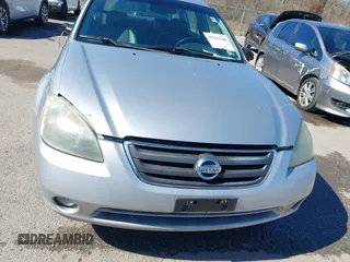 2003 Nissan Altima S with VIN 1N4AL11D63C321486, listed as a IAAI auction lot 41581386 with 200,082 mi miles. Bid and sale history available at carsss.com. Image 12.