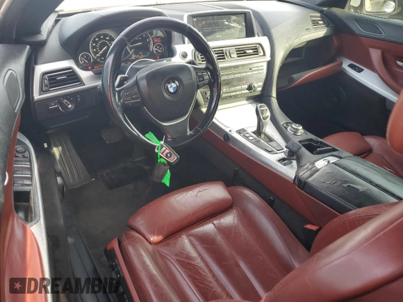 2012 BMW 6 Series 650i z VIN WBALZ3C56CDL72058, wystawiony jako Copart lot #43246815 z przebiegiem 133 048 mil mil oraz Tytuł czysty. Historia ofert i sprzedaży dostępna na DreamBid. Obrazek 8.