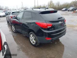 2011 Hyundai Tucson Limited with VIN KM8JUCAC5BU200544, listed as a IAAI auction lot 41952861 with 156,516 mi miles. Bid and sale history available at carsss.com. Image 3.