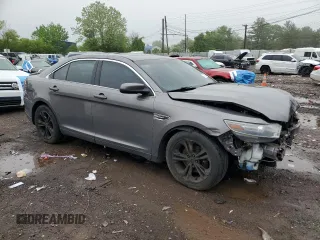 2013 Ford Taurus SEL z VIN 1FAHP2E87DG104349, wystawiony jako Copart lot #57143135 z przebiegiem 129 927 mil mil oraz Szkoda całkowita • Salvage title. Historia ofert i sprzedaży dostępna na DreamBid. Obrazek 4.