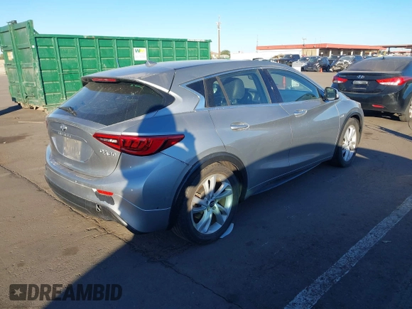 2018 Infiniti QX30 Luxury with VIN SJKCH5CPXJA057522, listed as a IAAI auction lot 41070985 with 79,007 mi miles and . Bid and sale history available at DreamBid. Image 4.