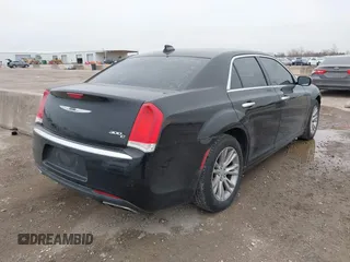2016 Chrysler 300 with VIN 2C3CCAEG5GH333935, listed as a IAAI auction lot 41433834 with 131,524 mi miles. Bid and sale history available at carsss.com. Image 4.
