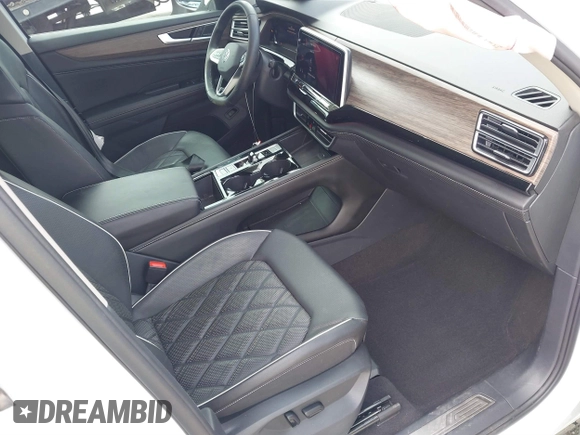 2024 Volkswagen Atlas SEL Premium R-Line z VIN 1V2FR2CA6RC547798, wystawiony jako IAAI lot #41723656 z przebiegiem 27 146 mil mil oraz . Historia ofert i sprzedaży dostępna na DreamBid. Obrazek 5.