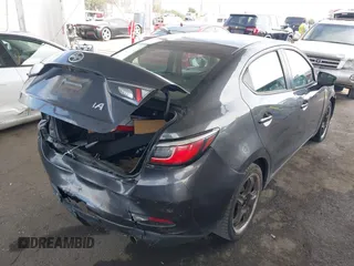 2016 Scion iA with VIN 3MYDLBZVXGY137502, listed as a IAAI auction lot 42047576 with 168,426 mi miles. Bid and sale history available at carsss.com. Image 4.