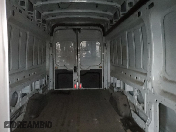 2019 Ford Transit Cargo with VIN 1FTBW3XM7KKA39855, listed as a Copart auction lot 85120994 with 121,522 mi miles and Salvage Title. Bid and sale history available at DreamBid. Image 10.