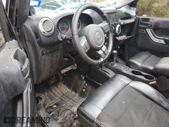 2012 Jeep Wrangler Unlimited Rubicon with VIN 1C4HJWFG7CL205244, listed as a Copart auction lot 86651914 with Not provided miles and Salvage title. Bid and sale history available at DreamBid. Image 8.