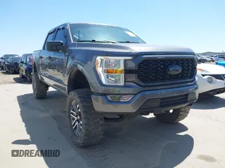 2021 Ford F-150 XL with VIN 1FTFW1E52MFB42324, listed as a IAAI auction lot 41916379 with 61,369 mi miles and . Bid and sale history available at DreamBid. Image 1.