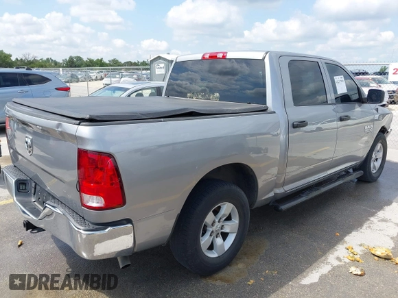 2019 Ram 1500 Tradesman z VIN 3C6RR6KG0KG705946, wystawiony jako IAAI lot #42217999 z przebiegiem 99 460 mil mil oraz . Historia ofert i sprzedaży dostępna na DreamBid. Obrazek 4.