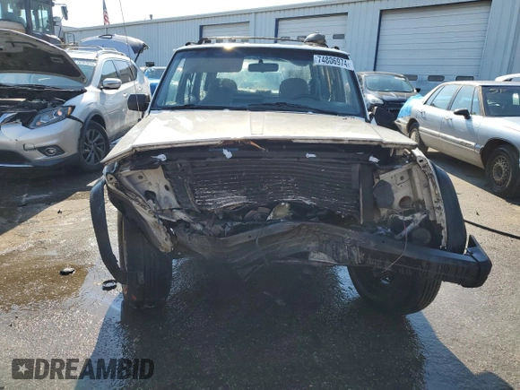1996 Jeep Cherokee Sport with VIN 1J4FT68S0TL120534, listed as a Copart auction lot 74806974 with 284,147 mi miles and Non Repairable. Bid and sale history available at carsss.com. Image 5.