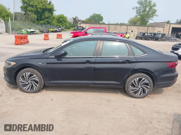 2020 Volkswagen Jetta SEL z VIN 3VWEB7BU9LM023817, wystawiony jako IAAI lot #42371694 z przebiegiem 99 100 mil mil oraz . Historia ofert i sprzedaży dostępna na DreamBid. Obrazek 14.