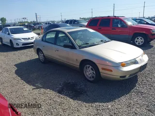 2000 Saturn SL z VIN 1G8ZK5277YZ178949, wystawiony jako IAAI lot #42153880 z przebiegiem 105 203 mil mil oraz . Historia ofert i sprzedaży dostępna na DreamBid. Obrazek 1.