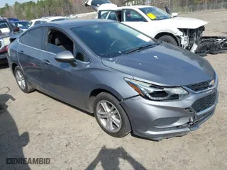 2018 Chevrolet Cruze LT with VIN 1G1BE5SMXJ7229696, listed as a IAAI auction lot 41782379 with 127,002 mi miles. Bid and sale history available at carsss.com. Image 1.