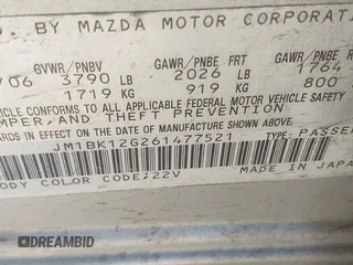 2006 Mazda 3 i with VIN JM1BK12G261477521, listed as a IAAI auction lot 41275792 with 201,642 mi miles and . Bid and sale history available at DreamBid. Image 9.