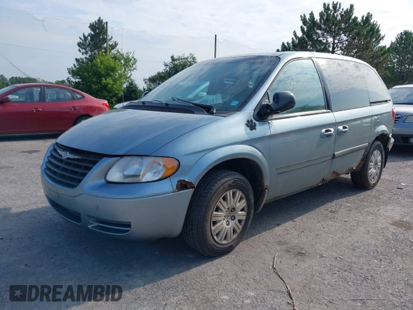 2005 Chrysler Town & Country with VIN 1C4GP45R35B326475, listed as a IAAI auction lot 40670759 with 199,230 mi miles. Bid and sale history available at carsss.com. Image 2.